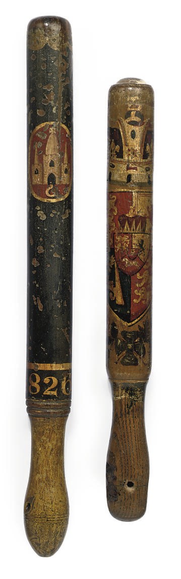 A GEORGE IV WEIGHTED WOOD TRUNCHEON
