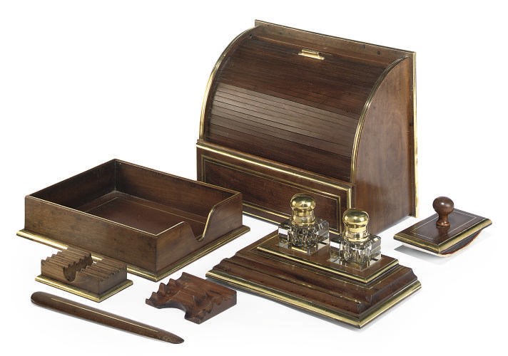 A FRENCH MAHOGANY AND BRASS INLAID SEVEN PIECE DESK SET