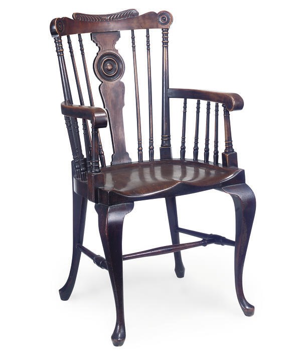 AN EARLY VICTORIAN MAHOGANY WINDSOR ARMCHAIR
