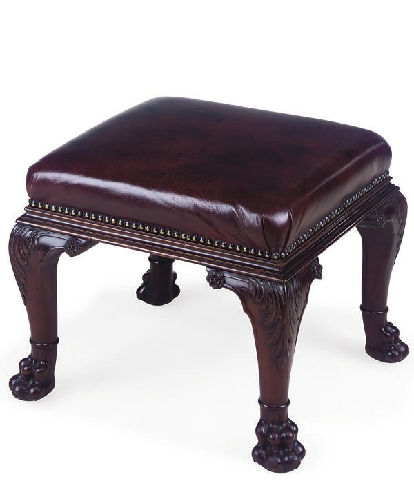 A MAHOGANY AND LEATHER UPHOLSTERED STOOL