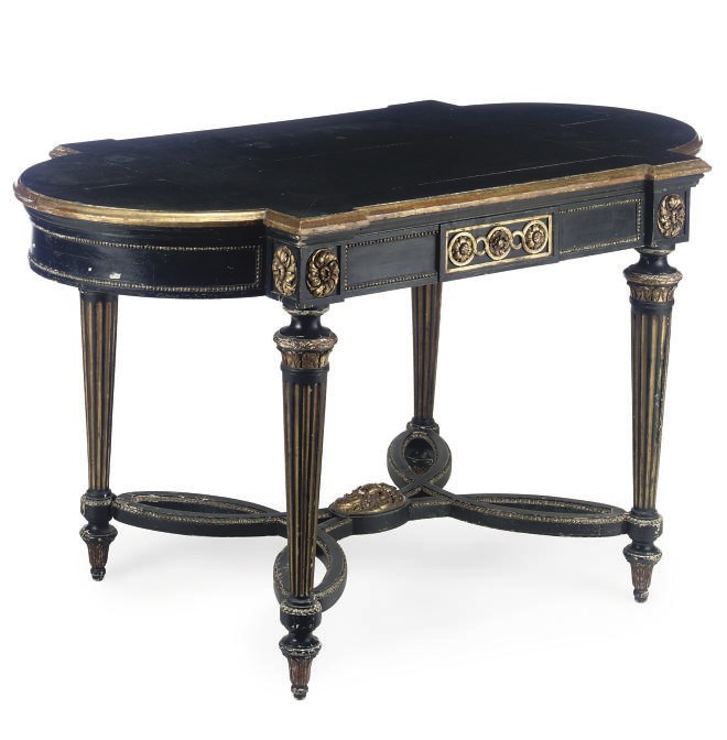 AN EBONISED AND PARCEL GILT CENTRE TABLE
