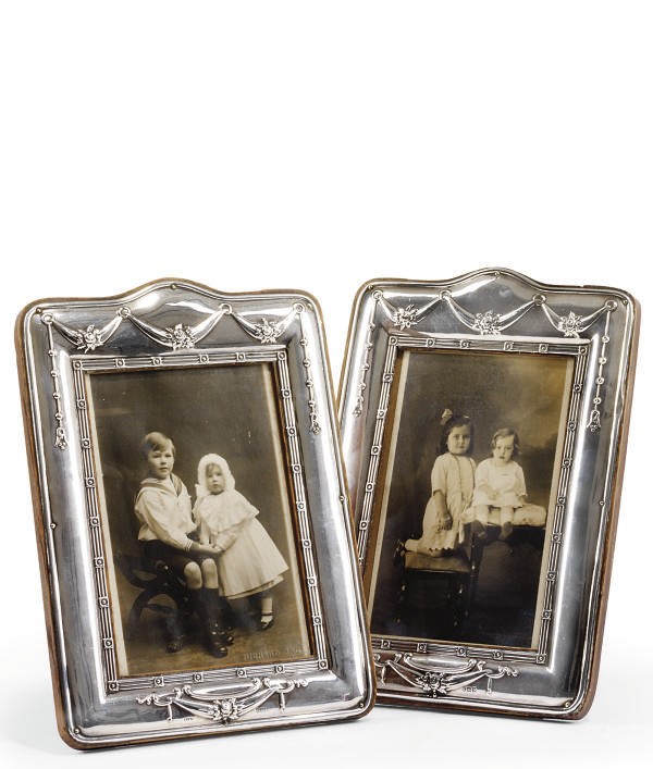 A PAIR OF SILVER-MOUNTED PHOTOGRAPH FRAMES