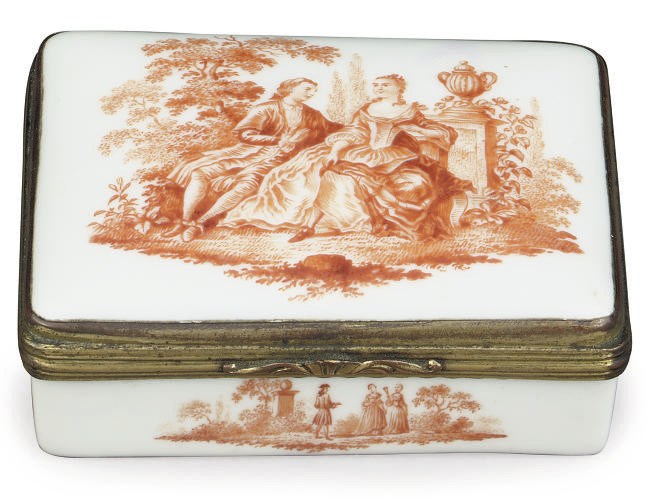 A GERMAN PORCELAIN RECTANGULAR GILT-METAL-MOUNTED SNUFF-BOX