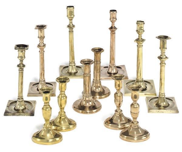 THREE PAIRS OF GEORGE III OR LATER BRASS CANDLESTICKS