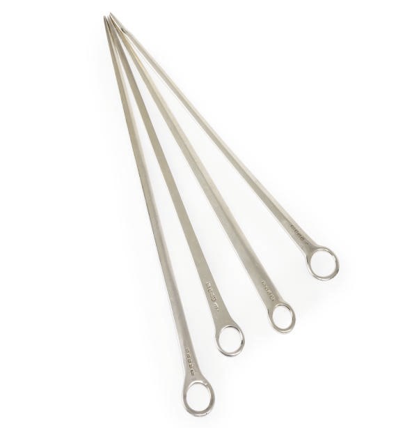 A GROUP OF FOUR GEORGE III SILVER MEAT SKEWERS