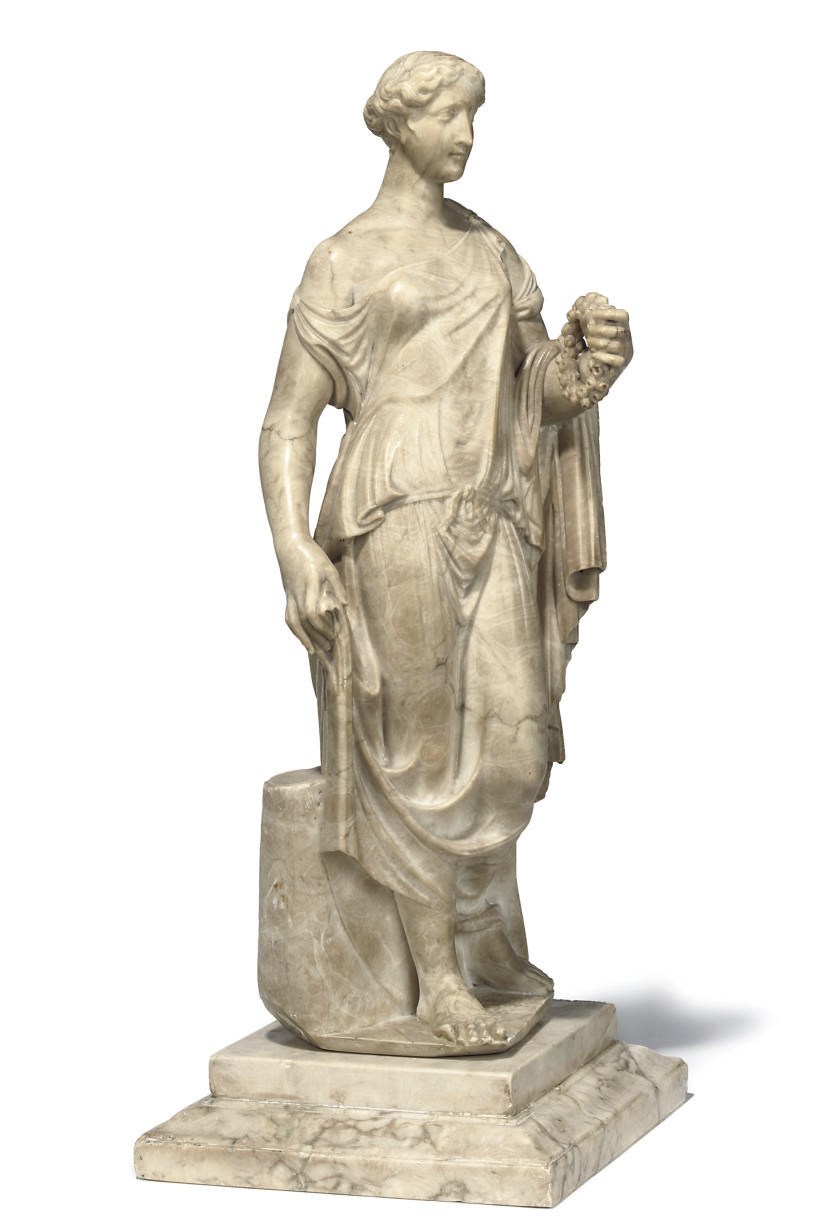 AN ITALIAN ALABASTER FIGURE OF FLORA