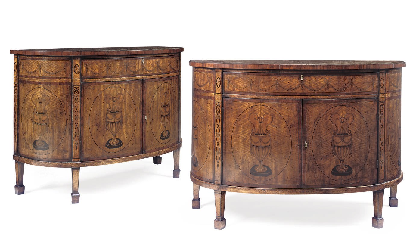 A PAIR OF DEMI-LUNE COMMODES
