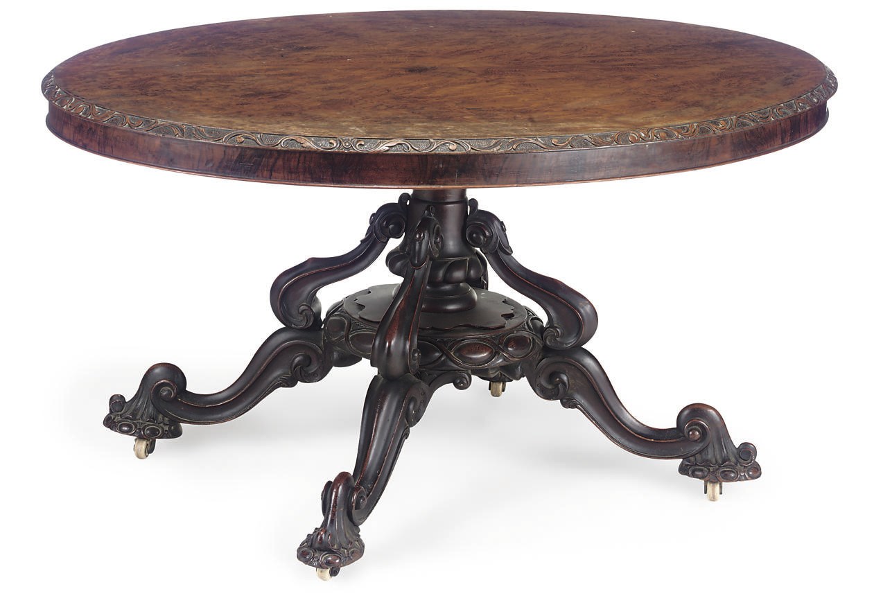 A MID VICTORIAN WALNUT BREAKFAST TABLE
