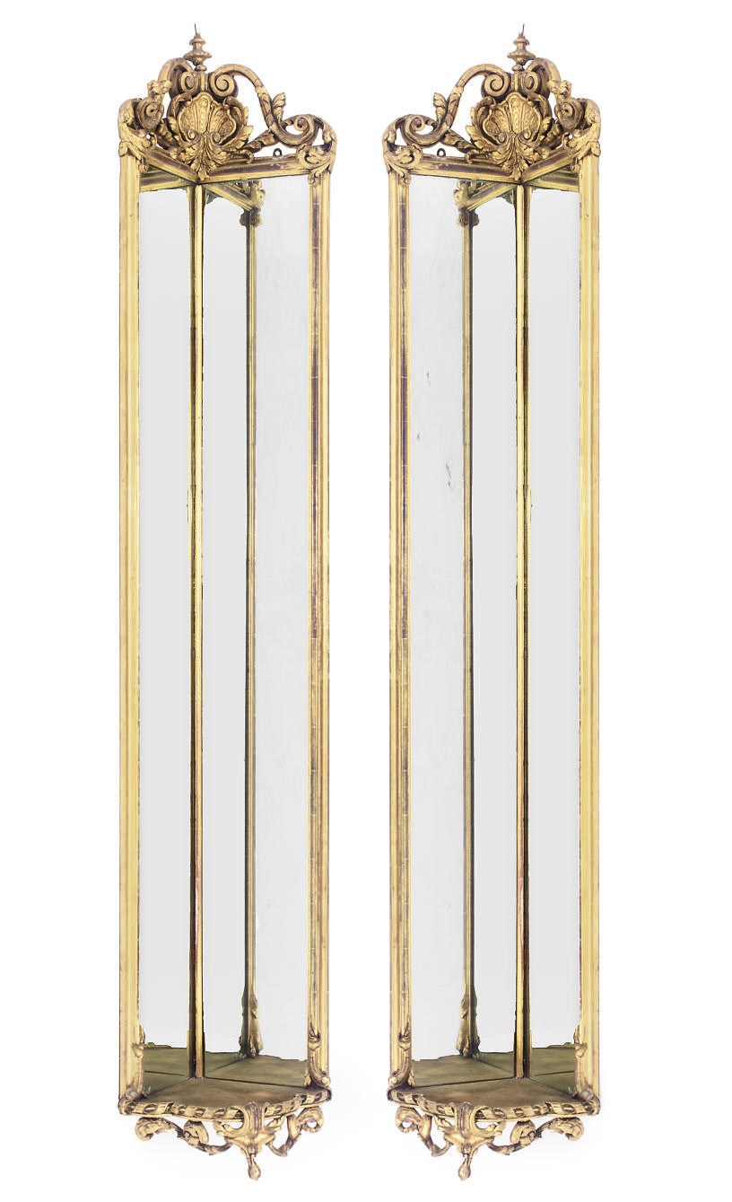 A PAIR OF GILTWOOD AND COMPOSITION CORNER TALL MIRRORS