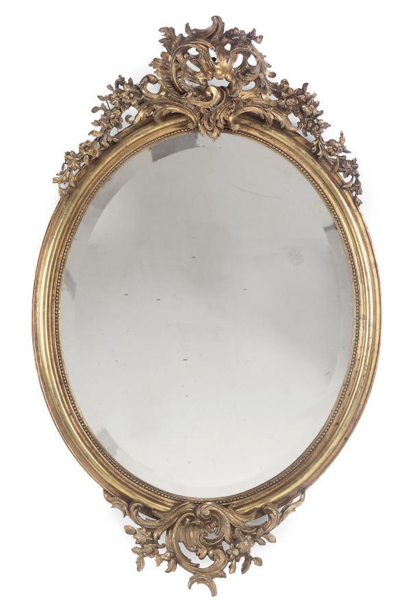 A VICTORIAN GILTWOOD AND COMPOSITION OVAL MIRROR