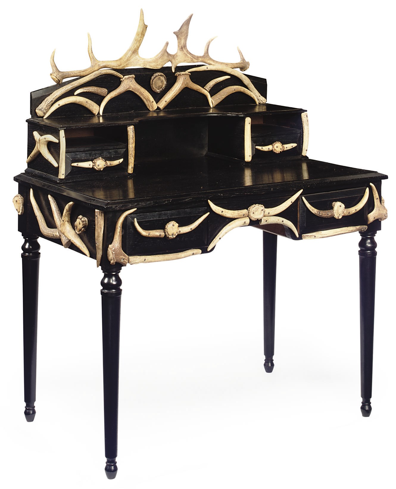 A GERMAN EBONISED AND ANTLER MOUNTED WRITING TABLE