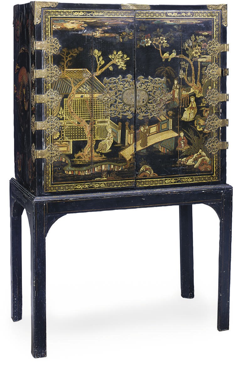 A CHINESE LACQUERED AND PARCEL GILT CABINET ON STAND
