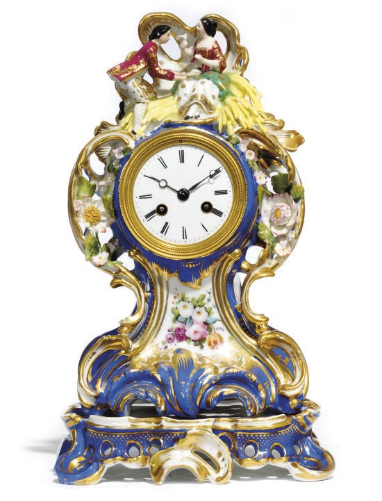 A French porcelain striking eight day mantel clock