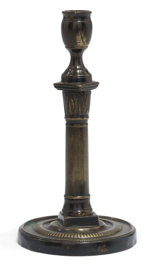 A FRENCH BRASS CANDLESTICK