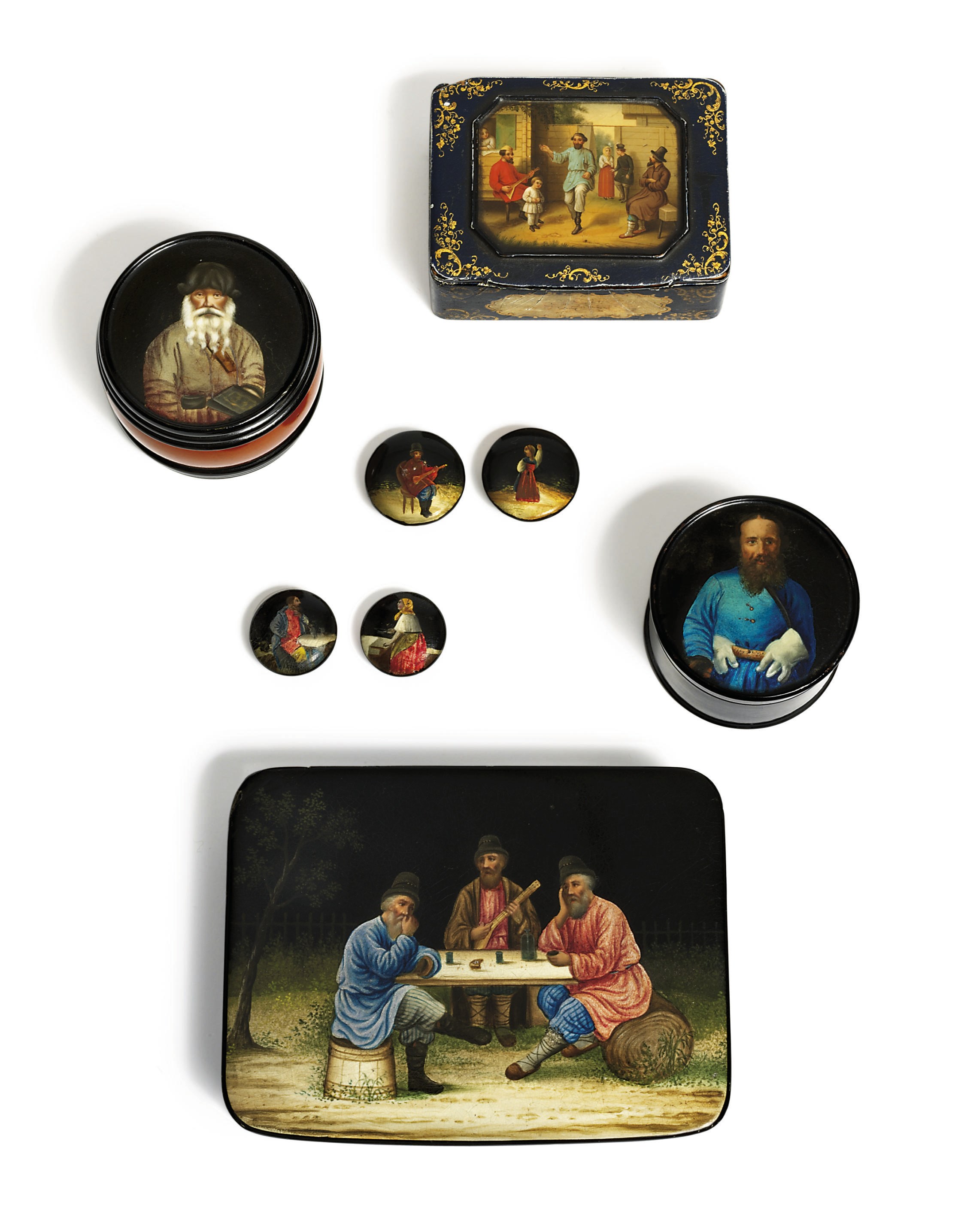 Four papier-mâché lacquer snuff-boxes and four studs