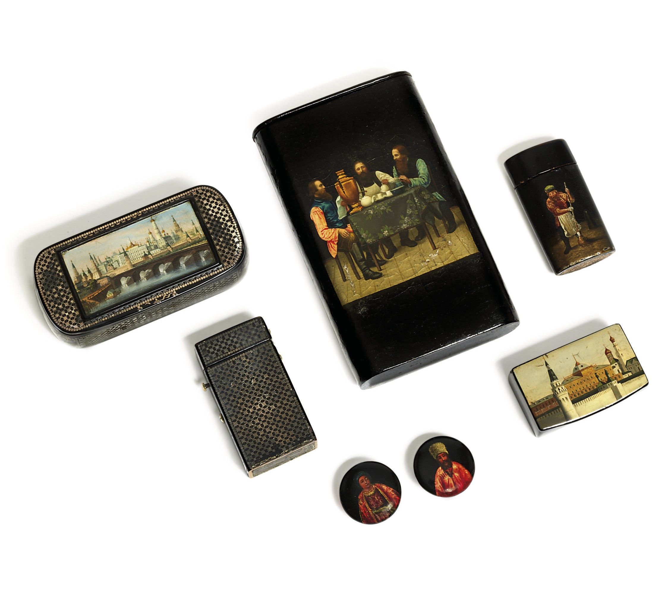 A group of papier-mâché lacquer including two snuff-boxes and two vesta-cases