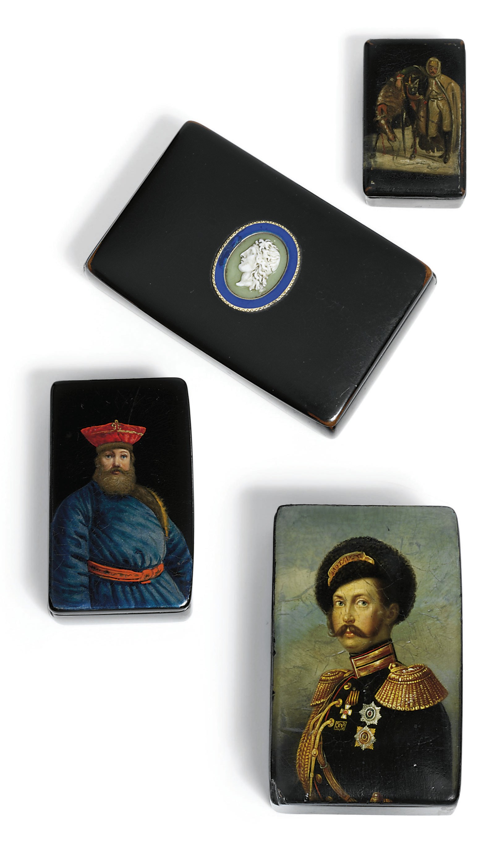 A group of four papier-mâché lacquer snuff-boxes