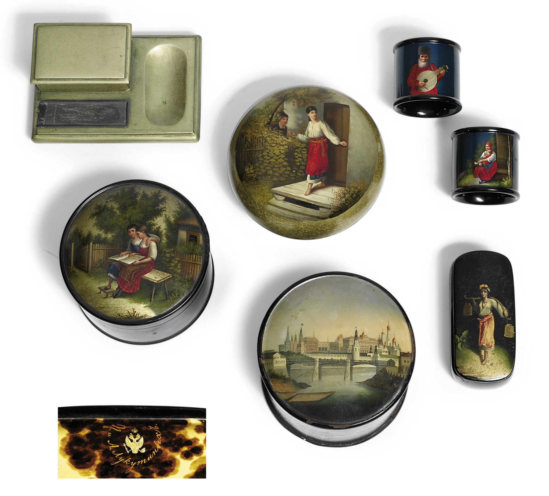 A group of four papier-mâché lacquer boxes, a pair of napkin rings and a vesta-tray