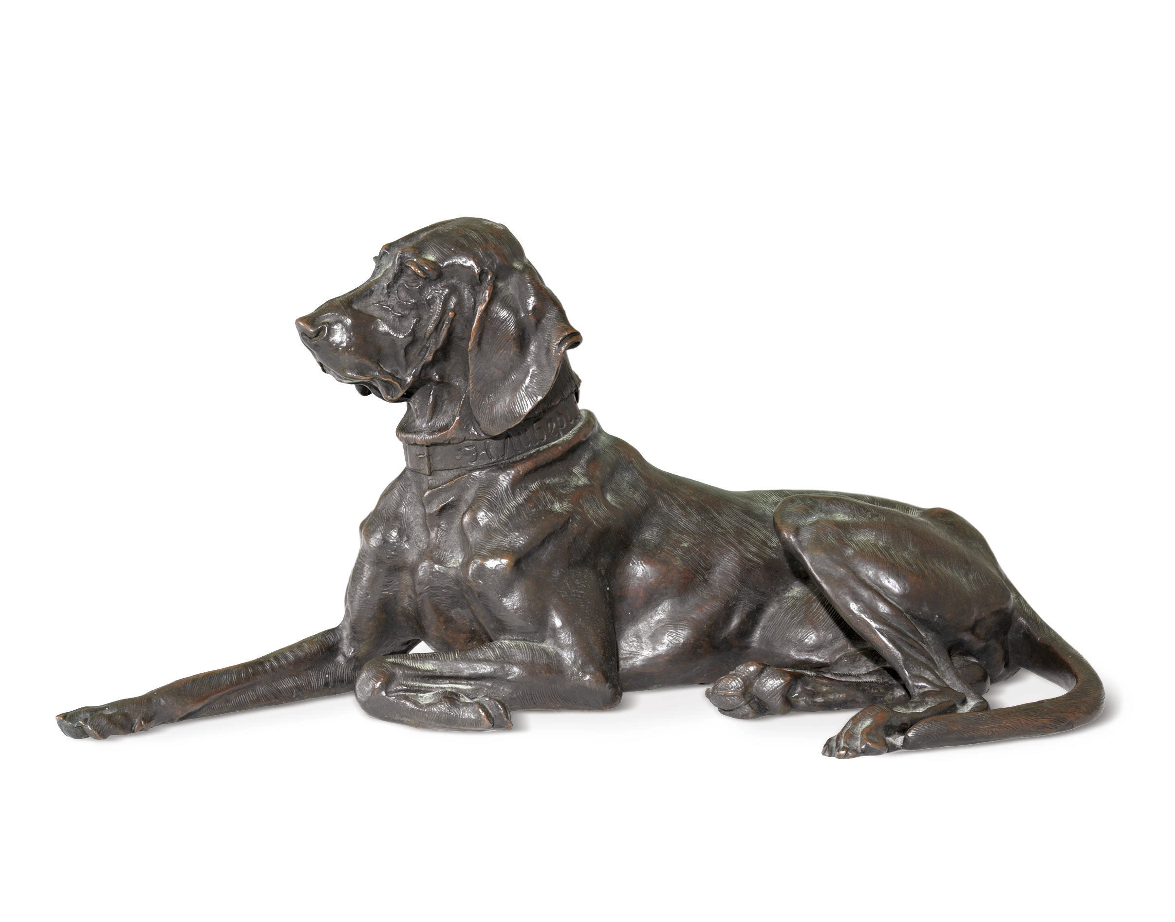 A Bronze Figure of a Resting Dog