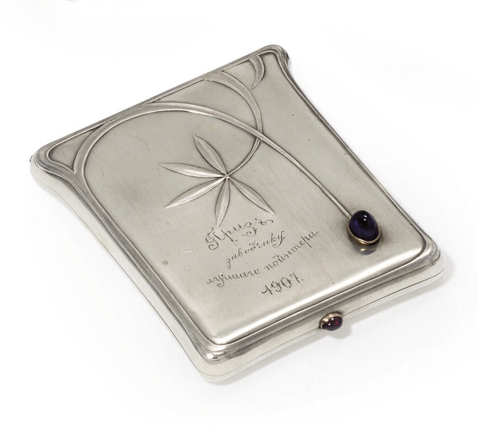 A jewelled silver cigarette-case