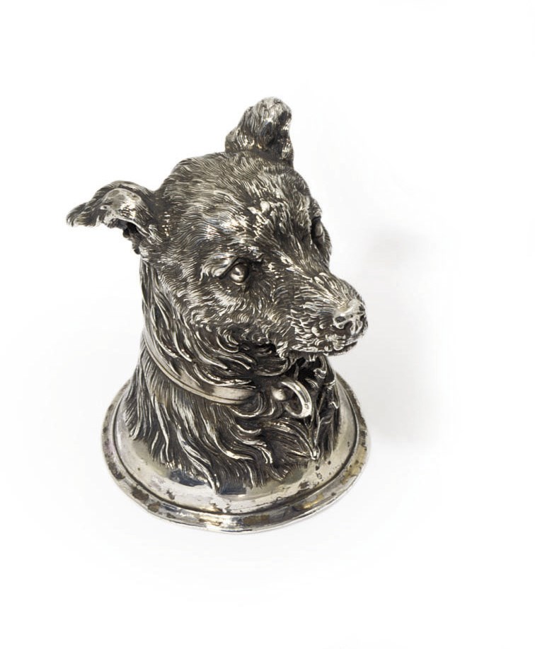 A silver stirrup cup in the form of a dog's head