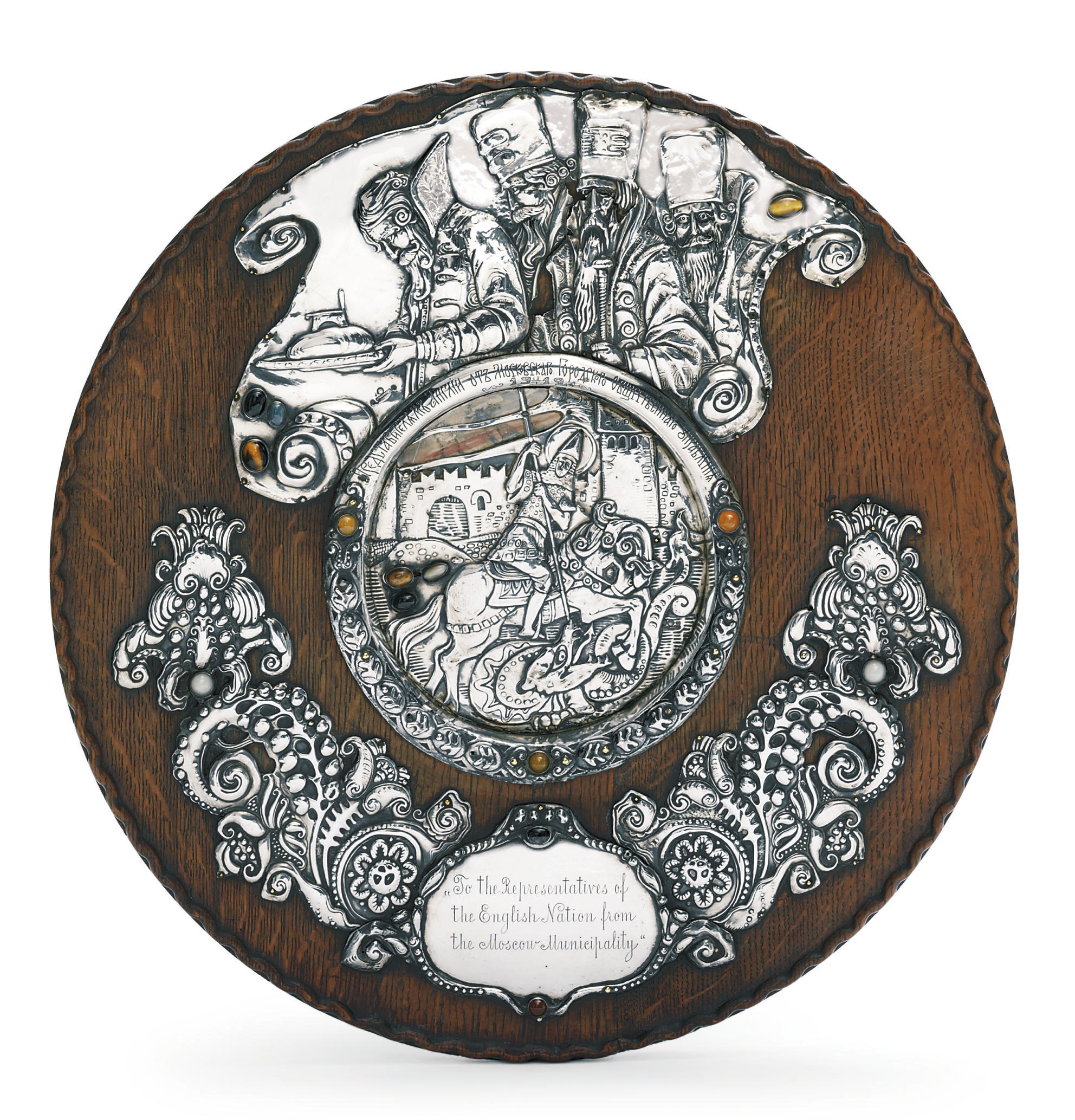 A large jewelled and enamelled silver-mounted wooden bread and salt platter