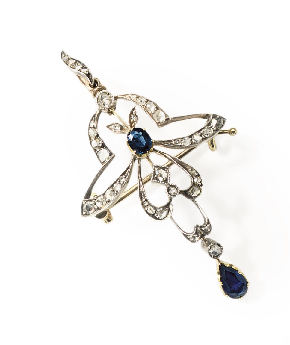 A sapphire and diamond pendant brooch