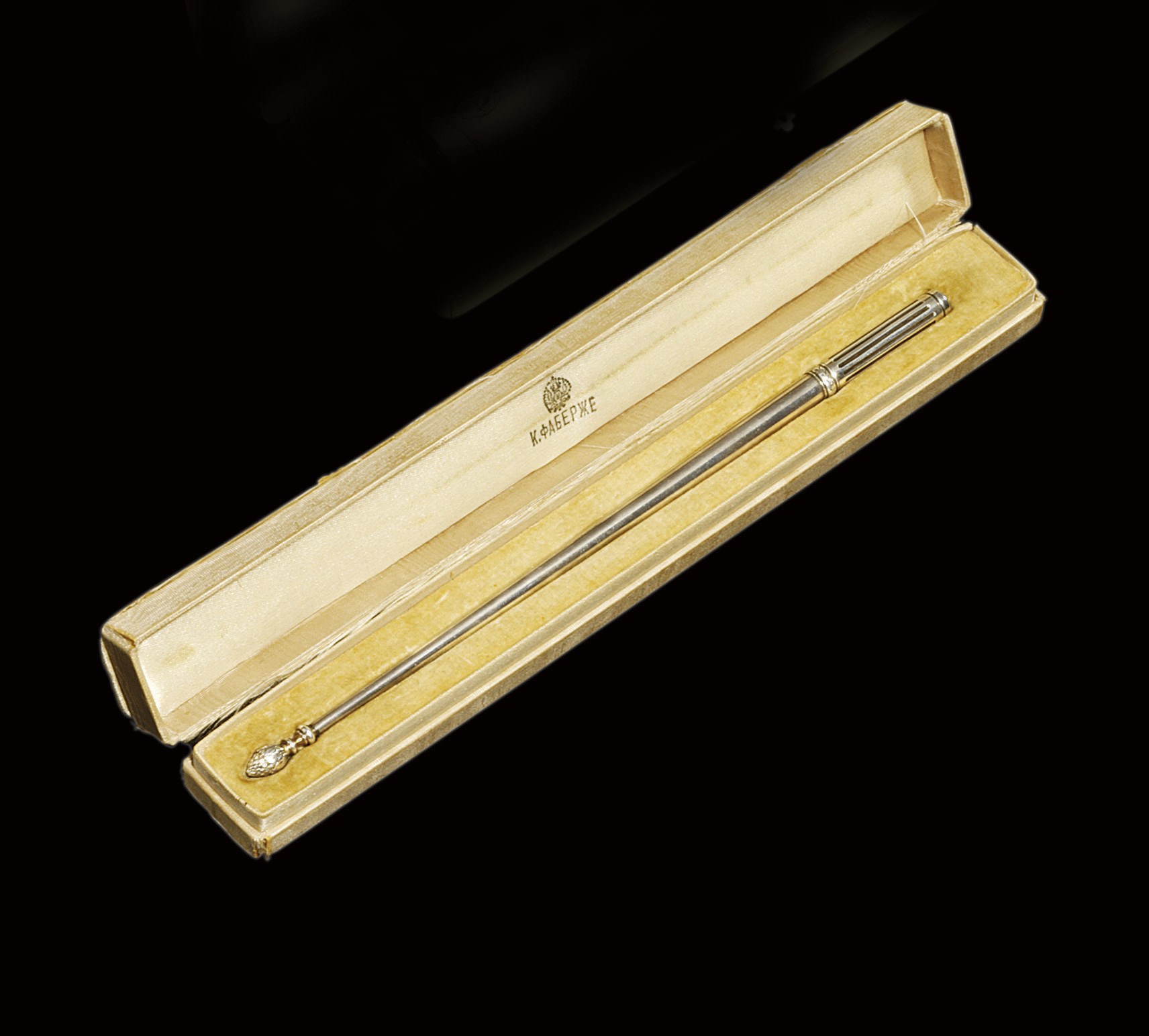 A silver pen-holder