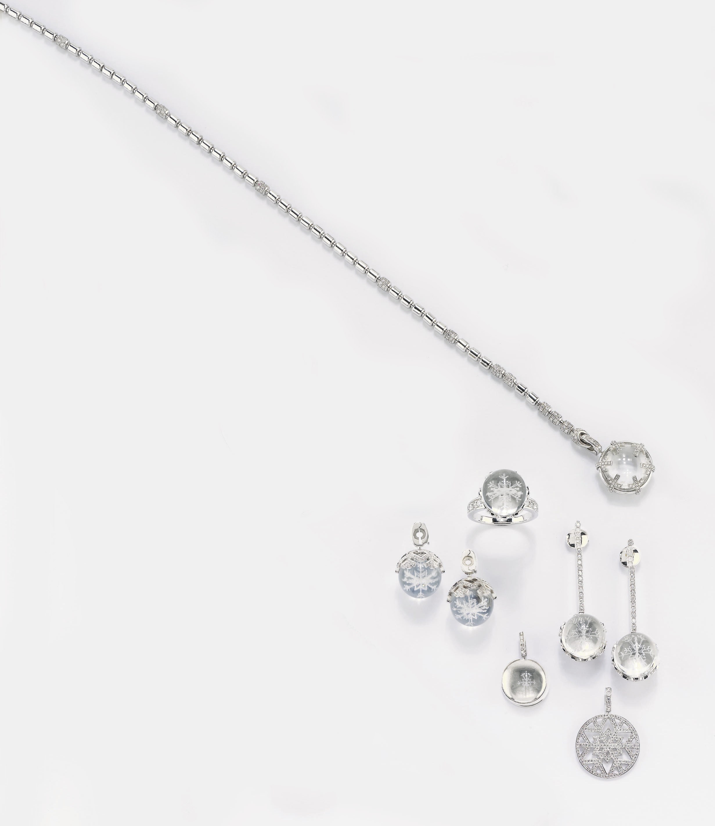 PARURE IN ORO, CRISTALLO DI ROCCA E BRILLANTI, PIAGET