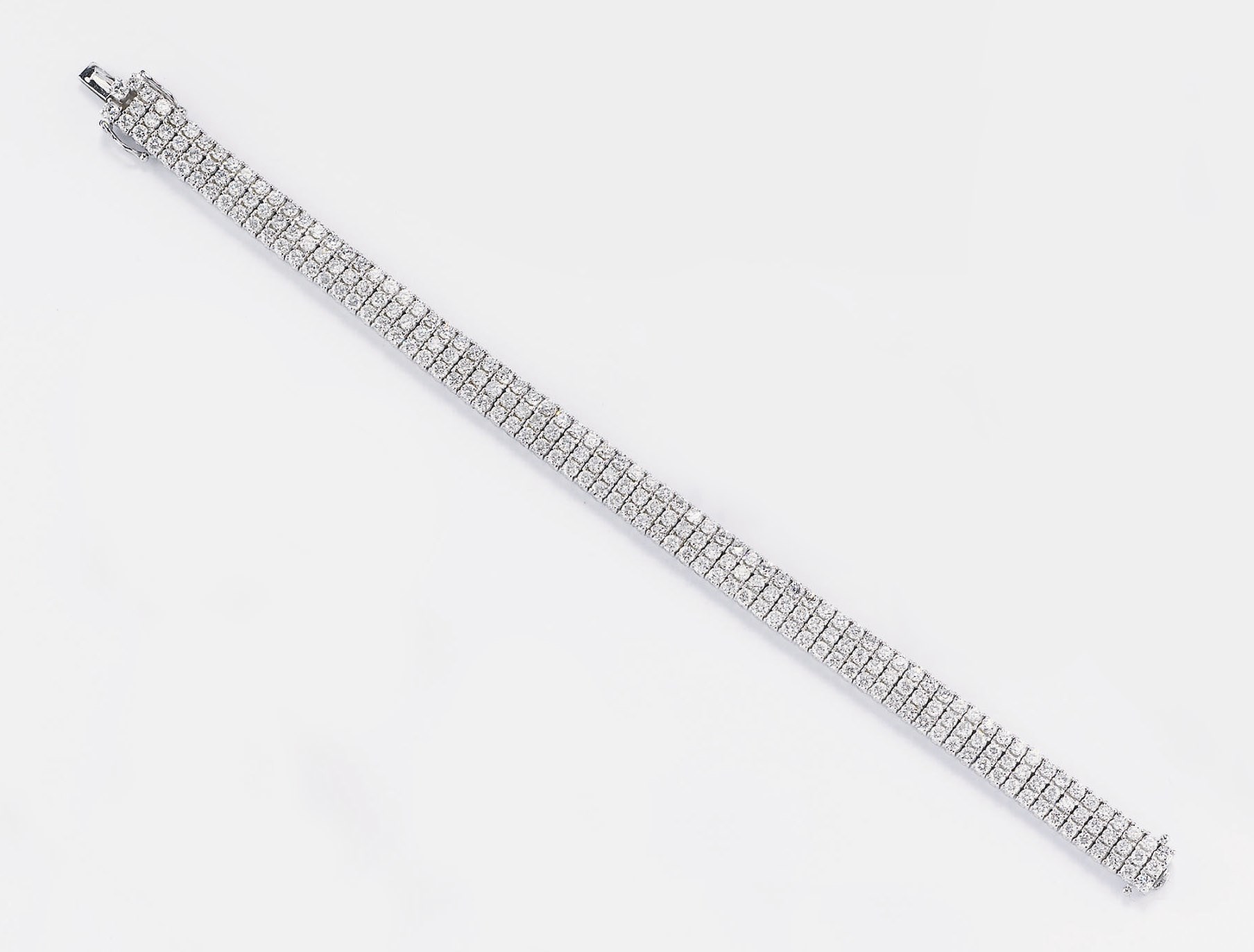 BRACCIALE SEMISNODATO IN ORO E DIAMANTI