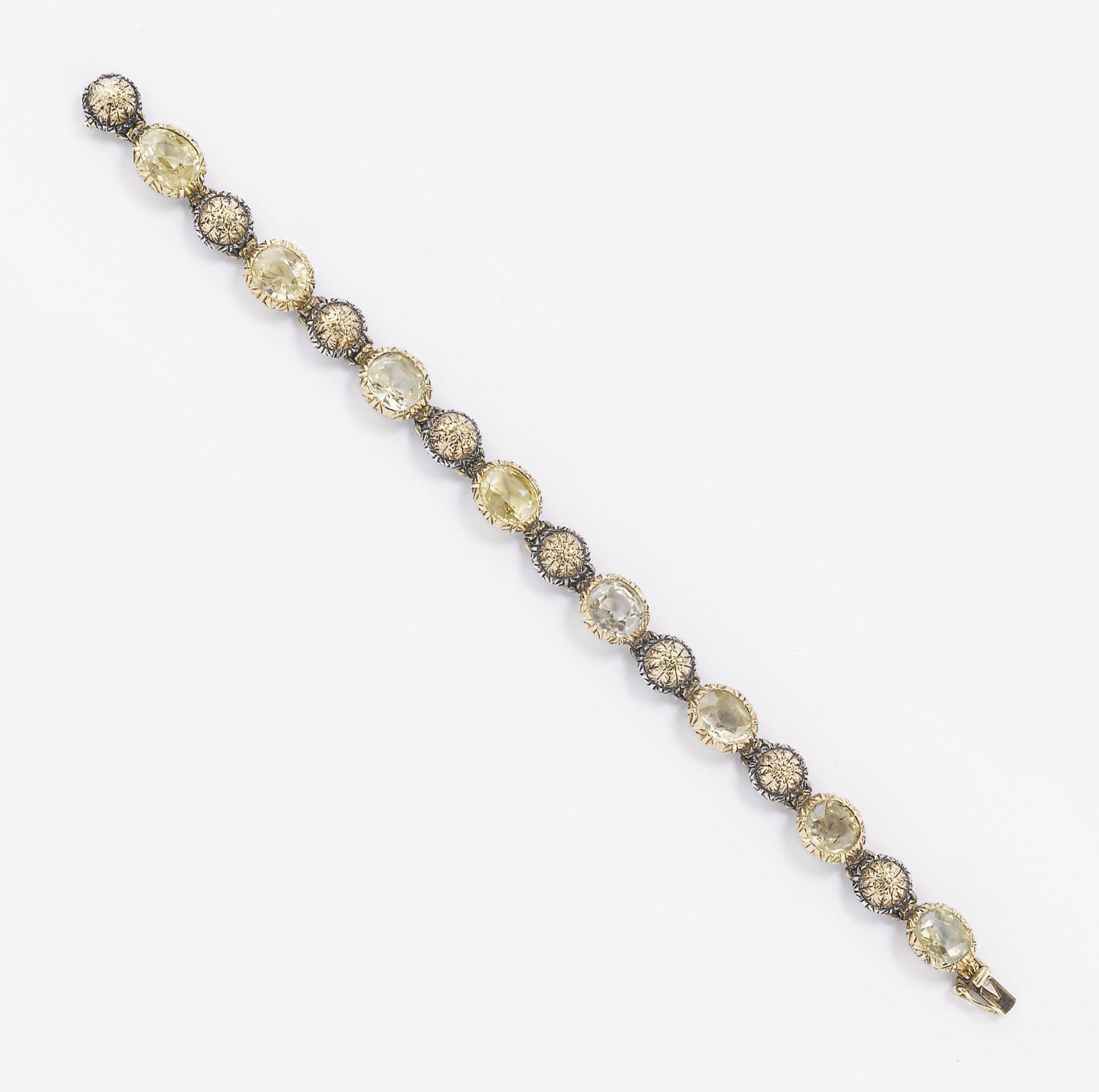 BRACCIALE SEMISNODATO CON ZAFFIRI GIALLI, FIRMATO MARIO BUCCELLATI
