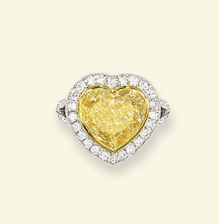 A COLOURED DIAMOND RING
