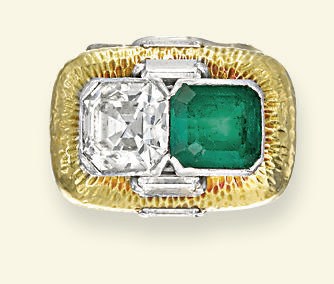AN EMERALD AND DIAMOND RING