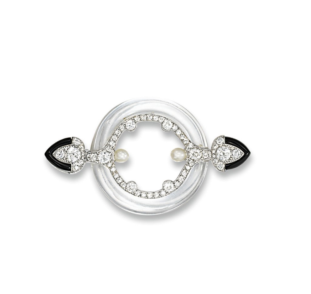 AN ART DECO ROCK CRYSTAL, DIAMOND, ONYX AND PEARL BROOCH, BY CARTIER
