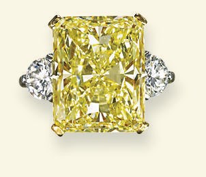 A COLOURED DIAMOND RING