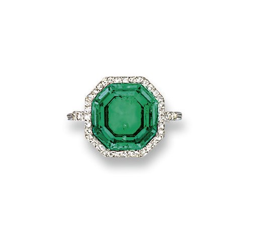 A BELLE EPOQUE EMERALD AND DIAMOND RING
