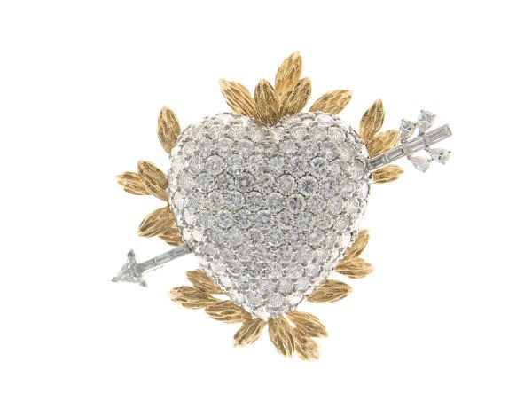 A DIAMOND, PLATINUM AND GOLD BROOCH