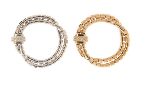 A PAIR OF DIAMOND, 18K GOLD AND 18K WHITE GOLD BRACELETS, BY PIAGET