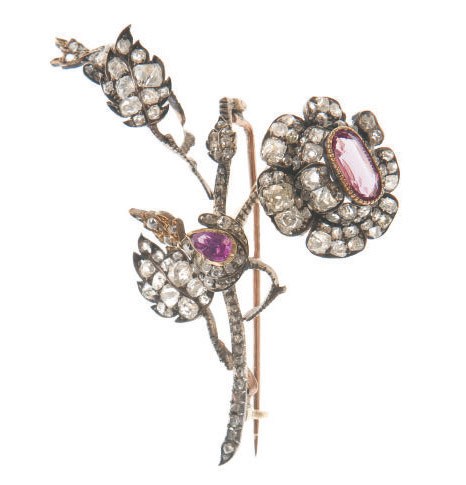 AN ANTIQUE PINK TOPAZ, GARNET, DIAMOND, SILVER AND GOLD BROOCH