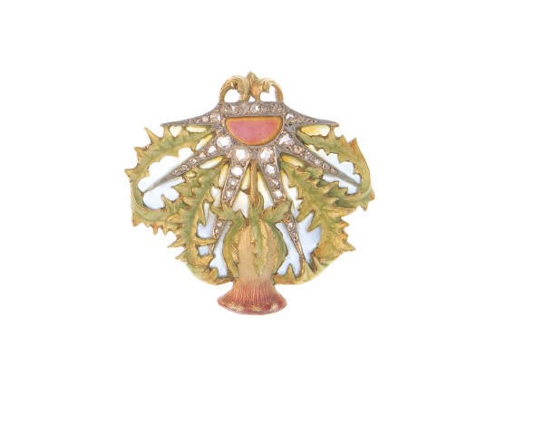 AN ART NOUVEAU ENAMEL AND DIAMOND THISTLE BROOCH