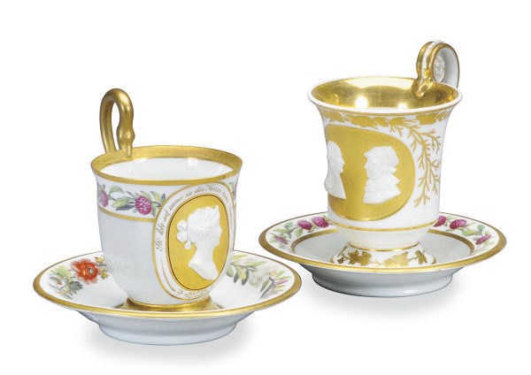 TWO GERMAN PARCEL- BISCUIT PORCELAIN COMMEMORATIVE CUPS AND TWO SAUCERS,