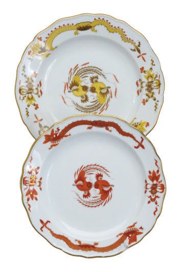 AN ASSEMBLED GERMAN PORCELAIN PART SERVICE IN THE YELLOW AND RED DRAGON PATTERNS,