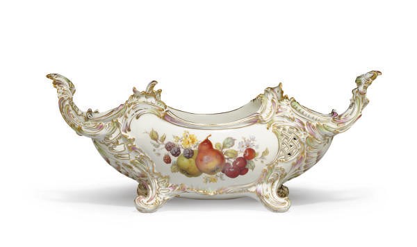 A GERMAN RETICULATED TWO-HANDLED CENTERPIECE,