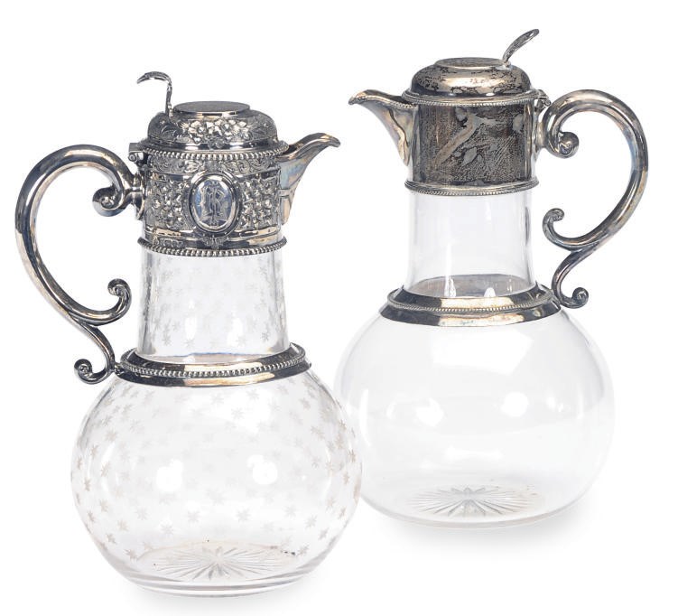 TWO VICTORIAN SILVER-MOUNTED GLASS CLARET JUGS,
