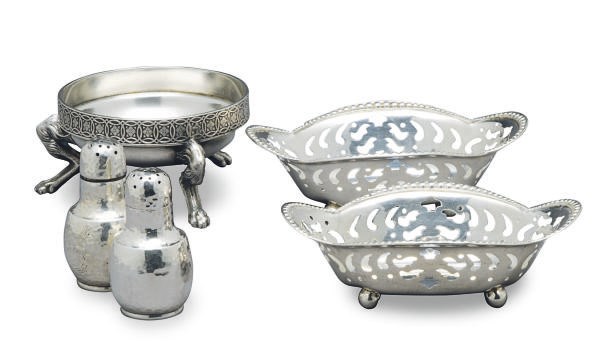 AN AMERICAN SILVER BOWL WITH MOLDED RIM, A SMALL FOOTED BOWL, A SALT CELLAR, A PAIR OF CASTERS, AND A PAIR OF RETICULATED NUT DISHES,