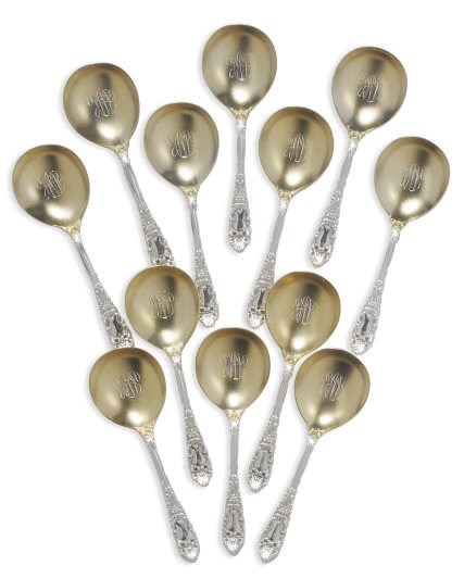 A GROUP OF TWELVE AMERICAN GILT SILVER BOULLION SPOONS,
