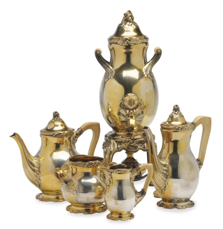 A FRENCH IVORY-MOUNTED SILVER GILT SIX PIECE TEA AND COFFEE SERVICE,**