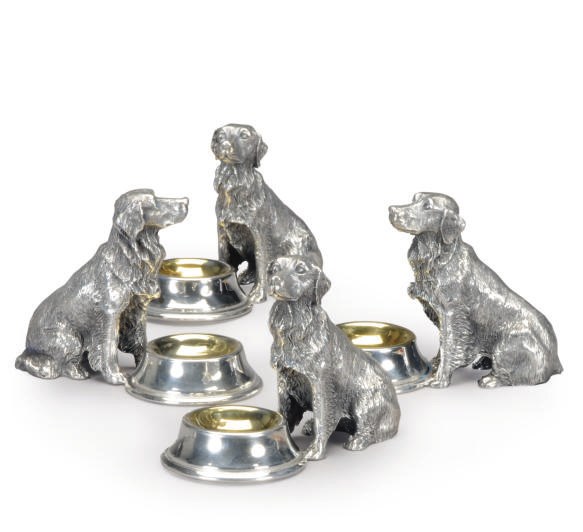 A SET OF FOUR AMERICAN SILVER-PLATED SALT CELLARS MODELED AS SEATED RETRIEVERS WITH BOWLS,
