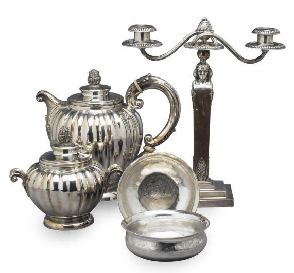 AN ITALIAN SILVER TEAPOT WITH HINGED COVER, A SUGAR BOWL AND COVER, AND A GERMAN SILVER TWO-LIGHT CANDELABRA,