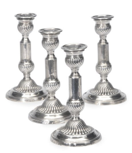 A SET OF FOUR GEORGE III SILVER TELESCOPIC CANDLESTICKS,